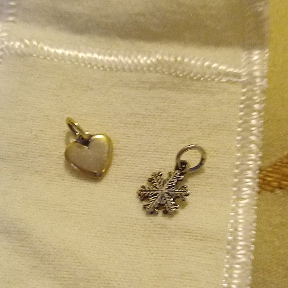 TWO JAMES AVERY CHARMS